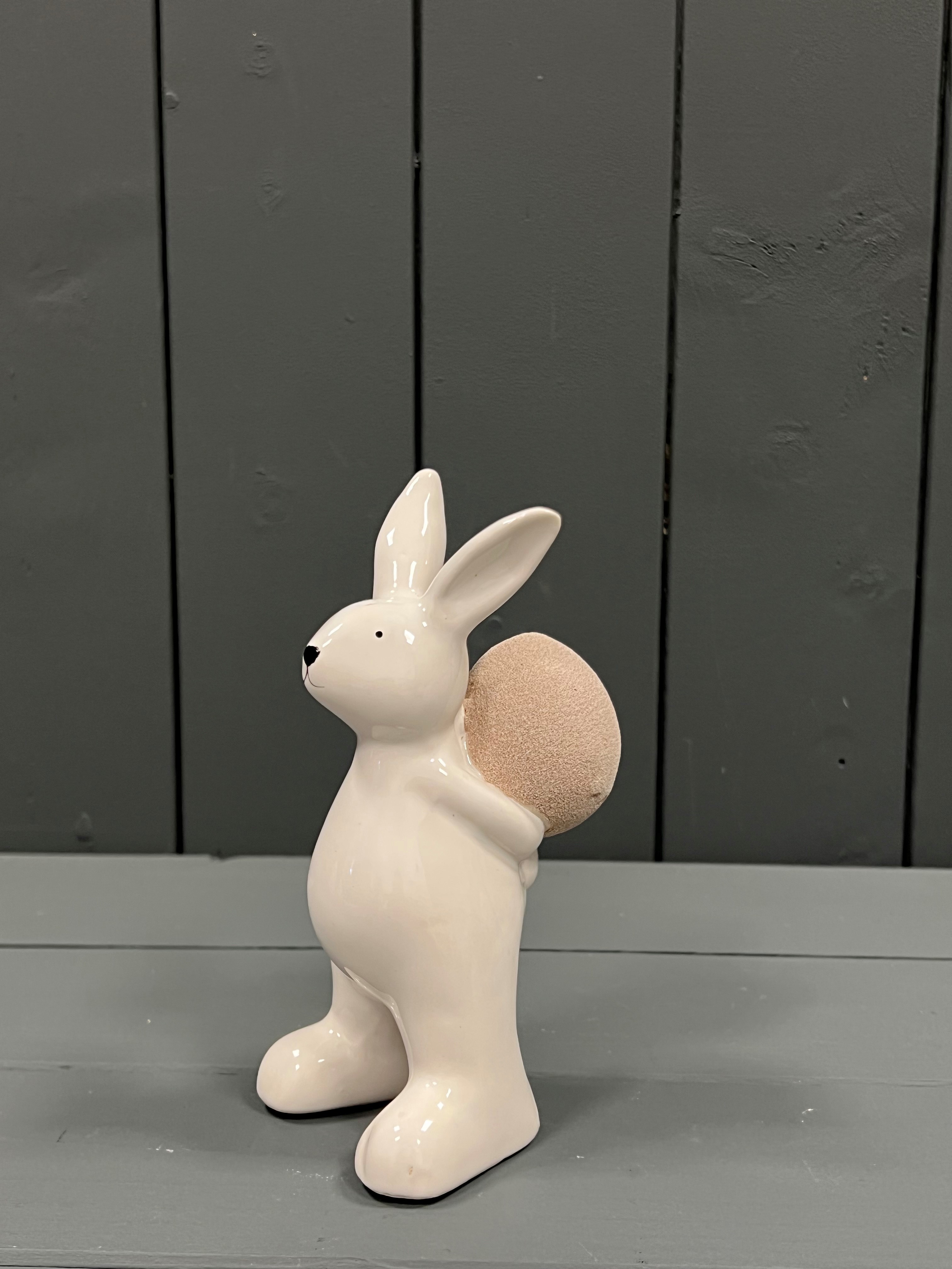 Medium White Ceramic Rabbit with Easter Egg detail page